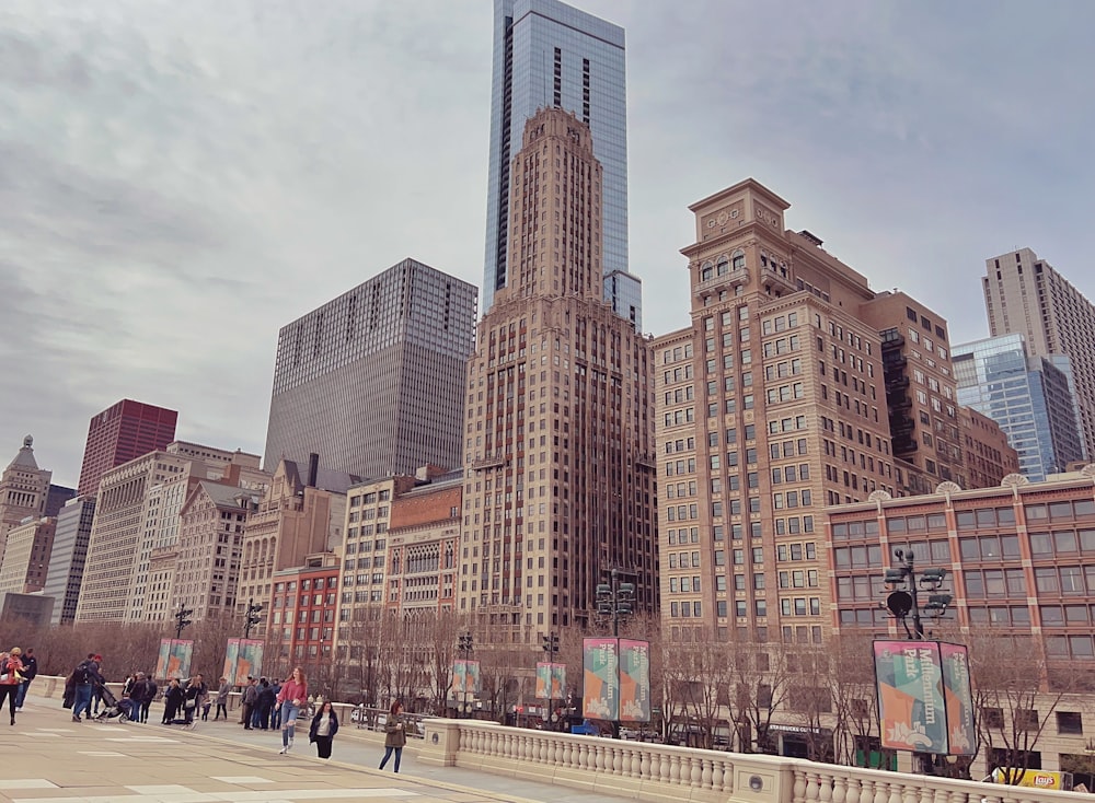 a group of people walking in a city