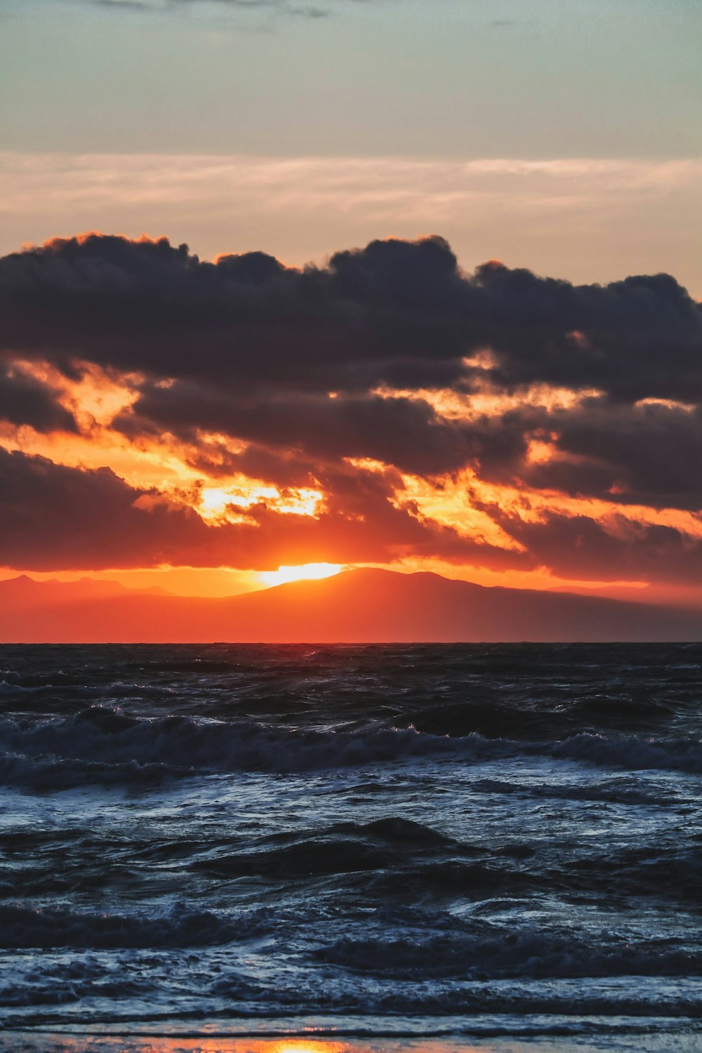 a sunset over the ocean