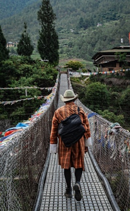 a person walking on a bridge