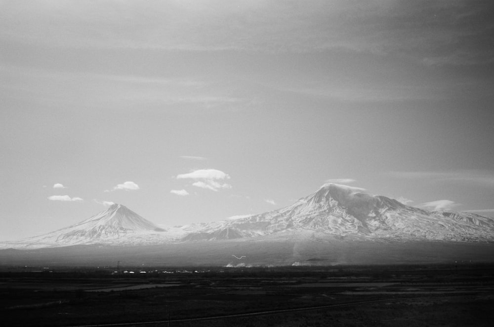 a snowy mountain in the distance