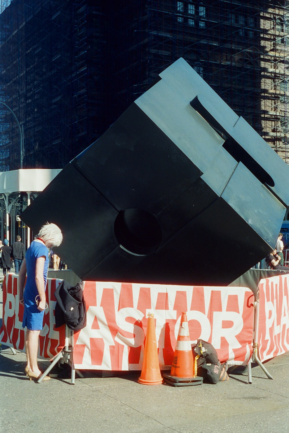 a large black and white sign with a black circle on it