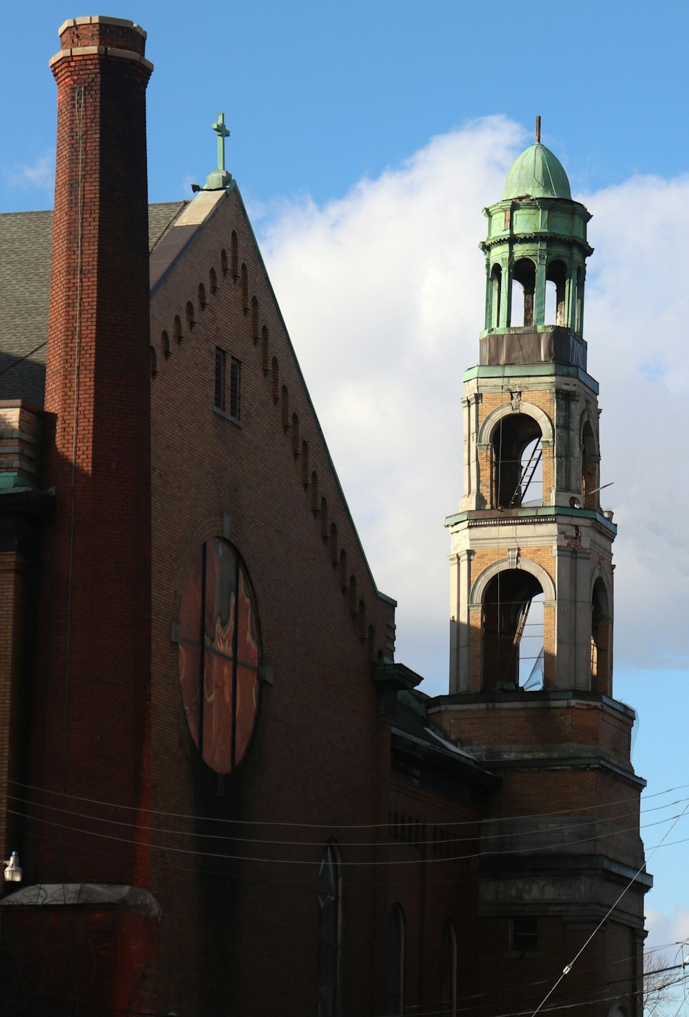 a large brick building with a clock tower