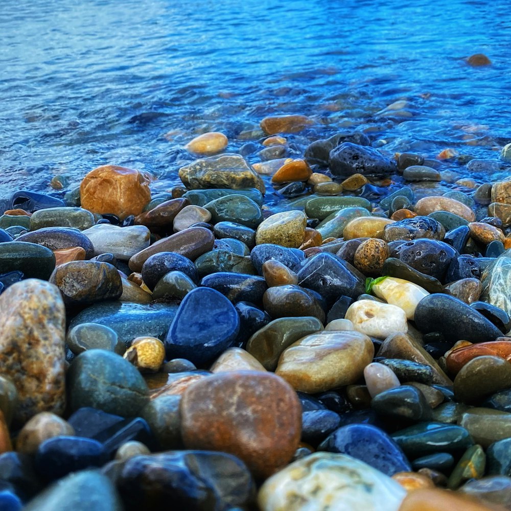 a group of rocks on a beach