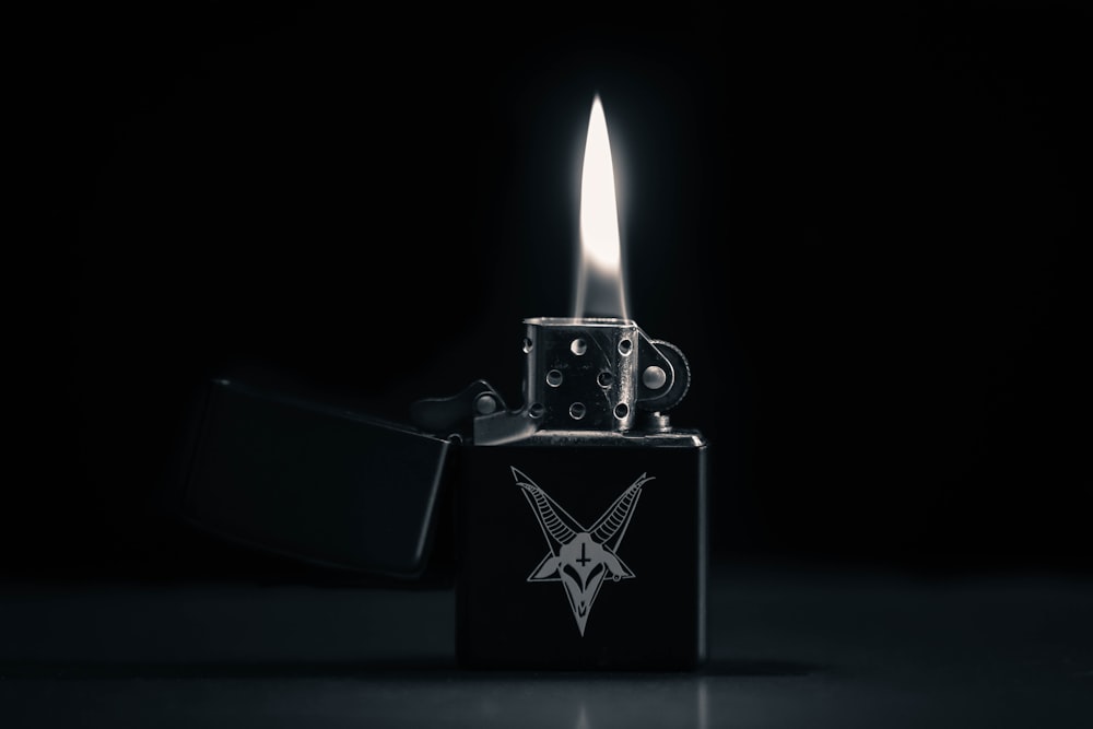 a lighter with a flame