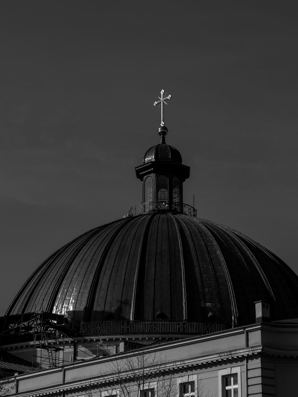 a domed building with a cross on top