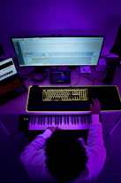 a person playing a keyboard