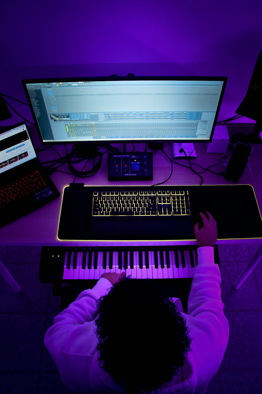 a person playing a keyboard