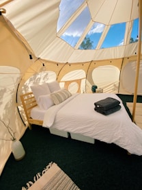 a couple of beds in a room