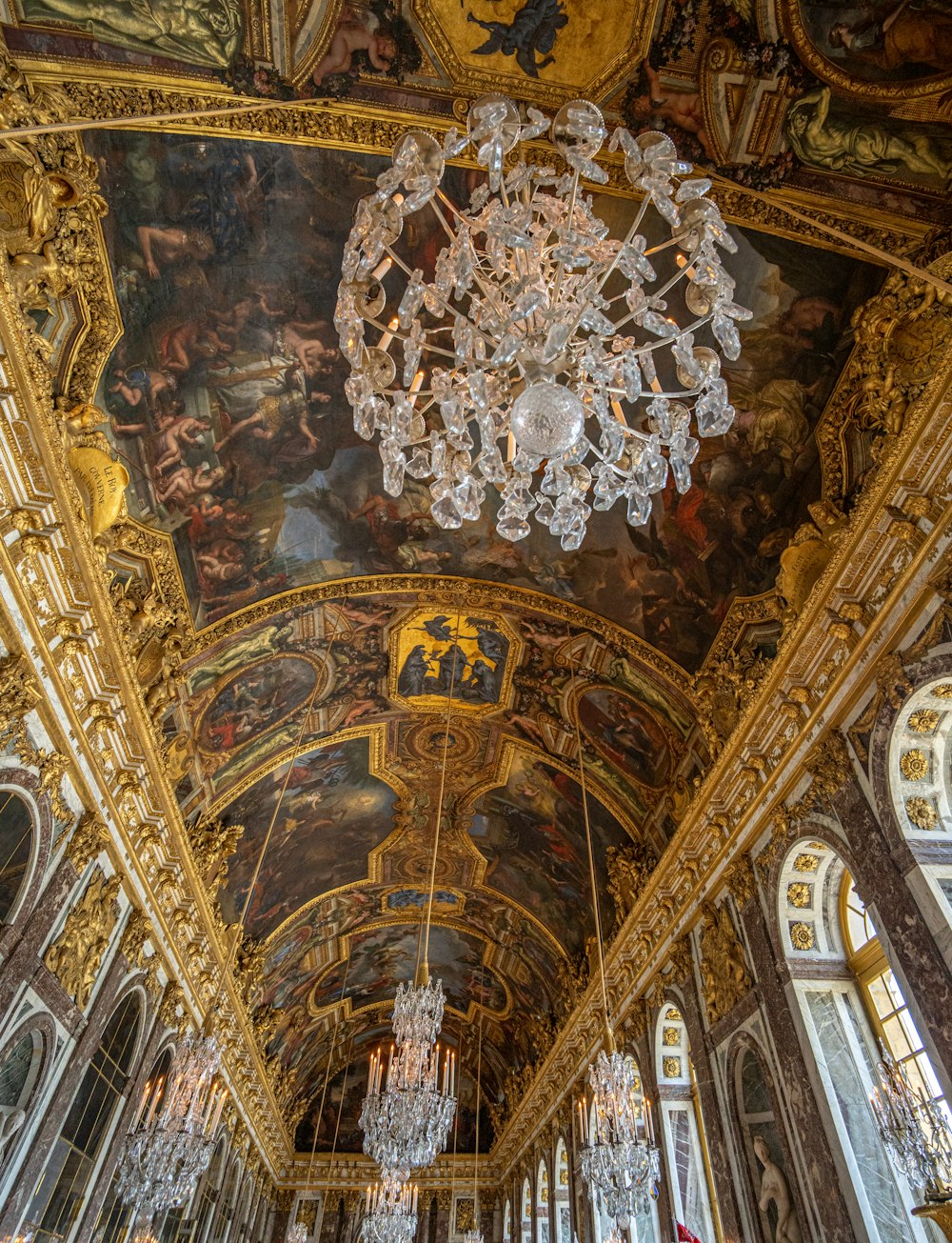 a large ornate ceiling with a clock