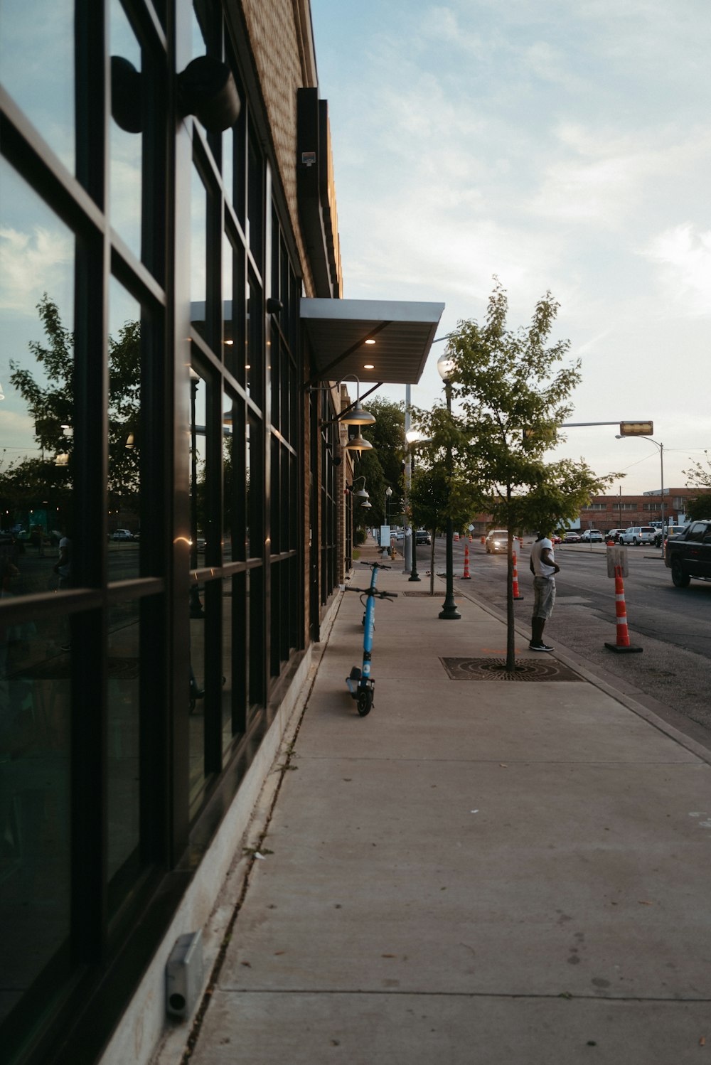 a person walking on a sidewalk