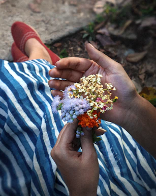 a person holding flowers