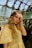 a woman in a yellow dress