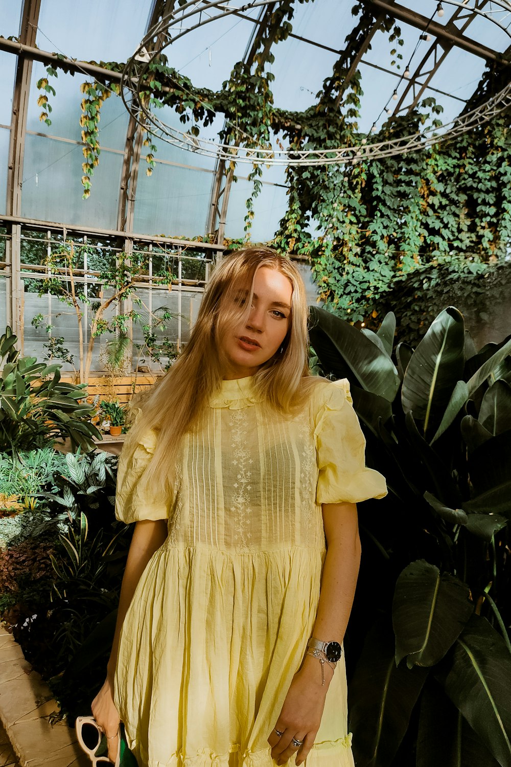 a woman in a yellow dress