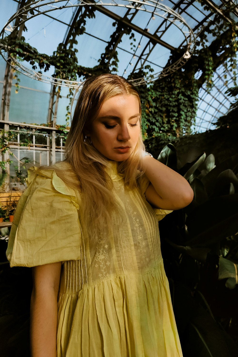 a woman in a yellow dress