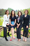 a group of women posing for a photo