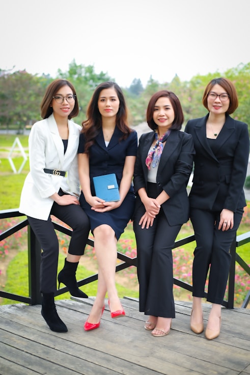 a group of women posing for a photo