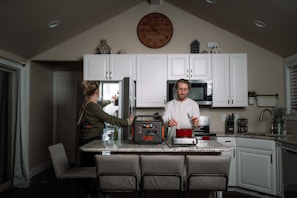 EcoFlow Power battery connected to home appliances in a modern kitchen