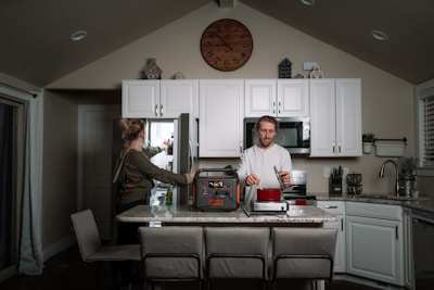 A modern kitchen featuring smart home improvement gadgets in use.