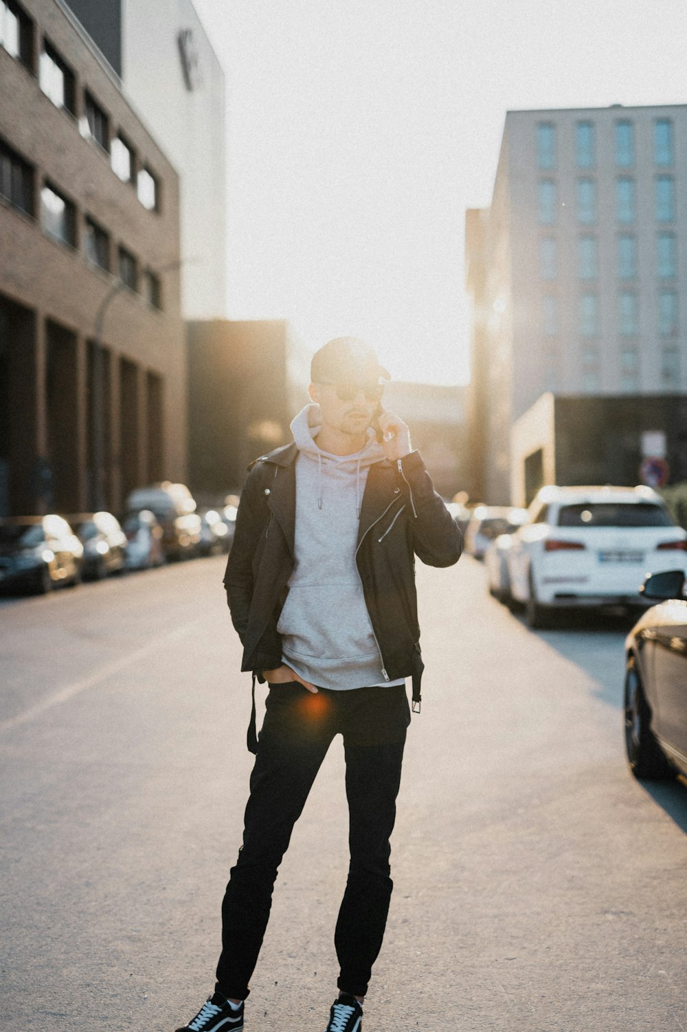 a person standing in the middle of a street