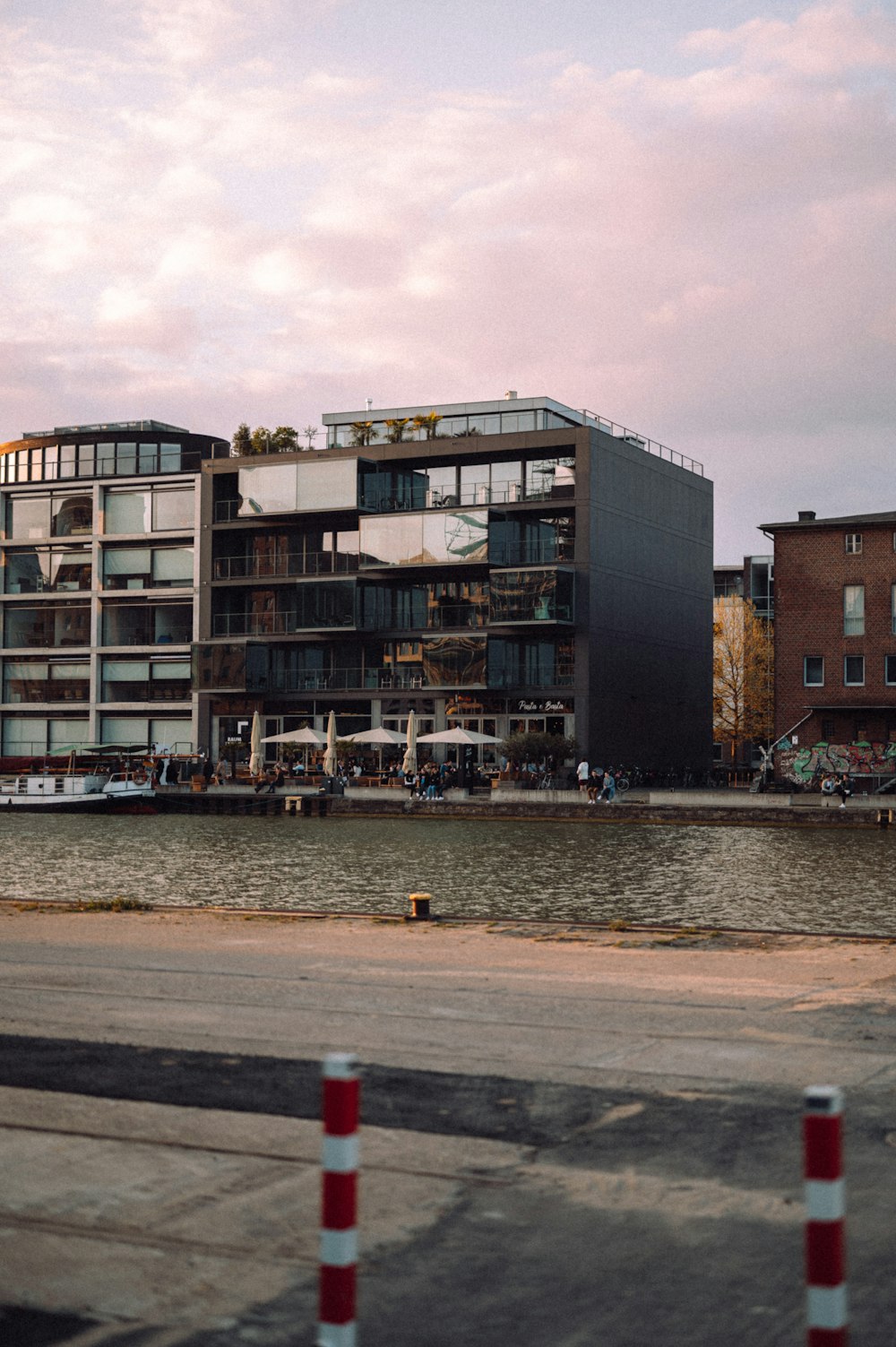 a building next to a body of water