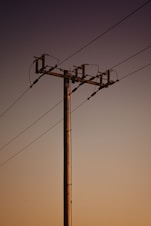 a telephone pole with wires