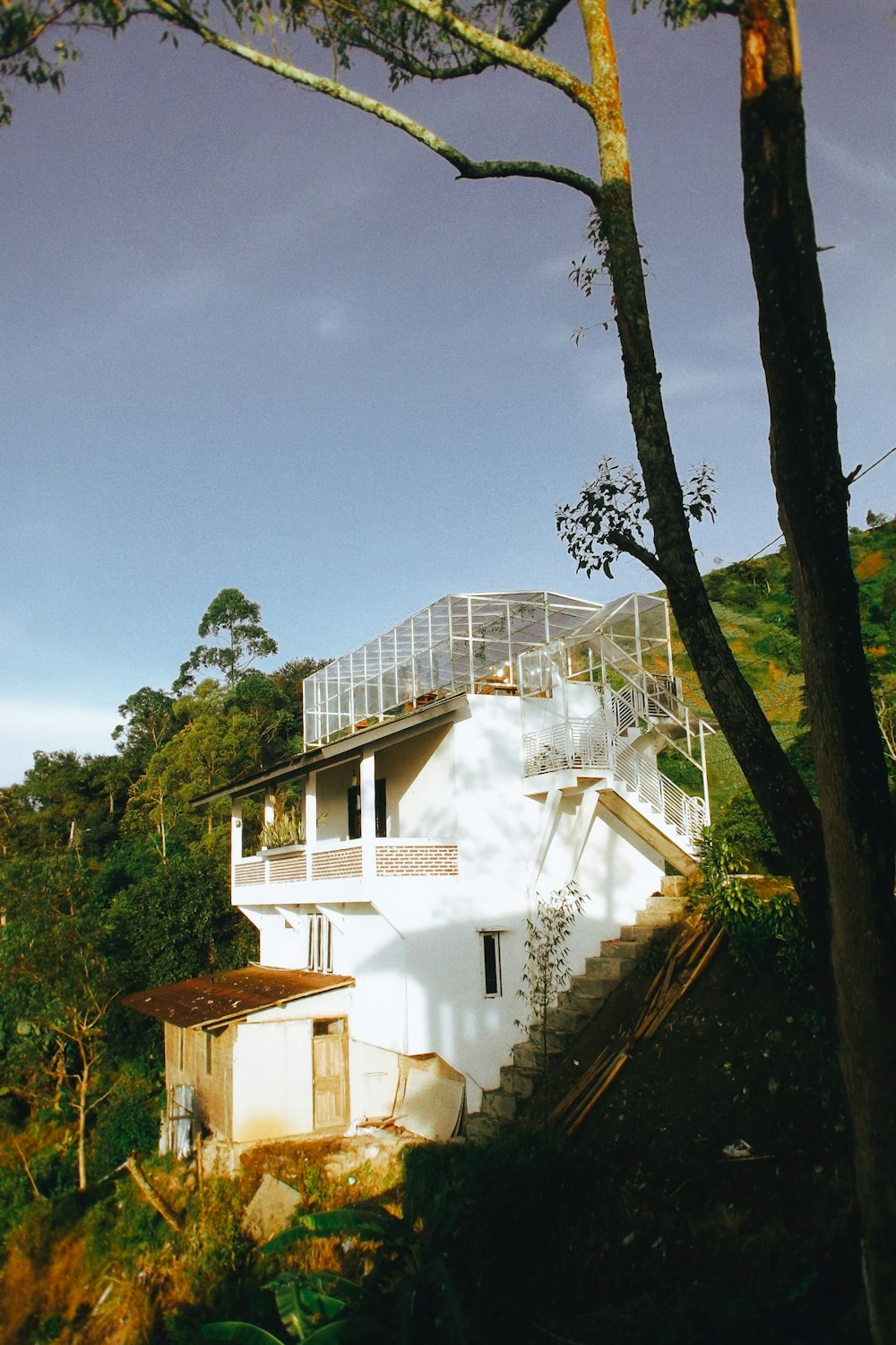 a white house with a staircase