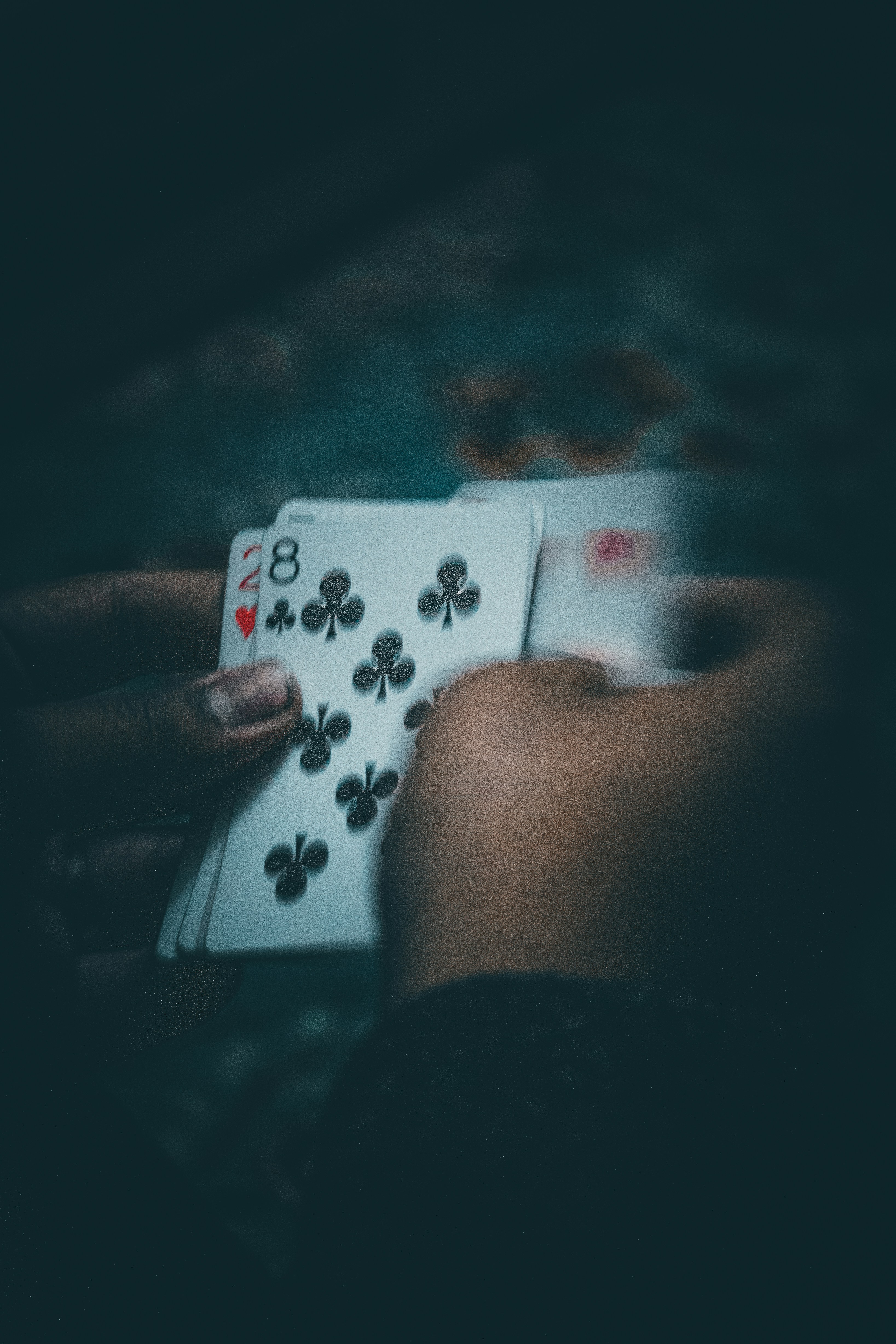 a hand holding a card