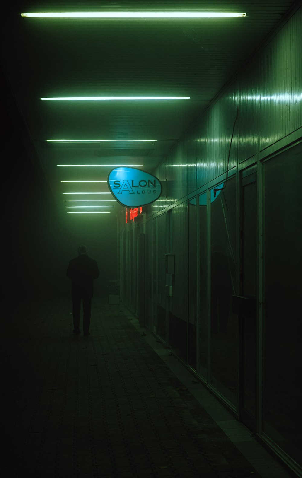 a person walking down a hallway