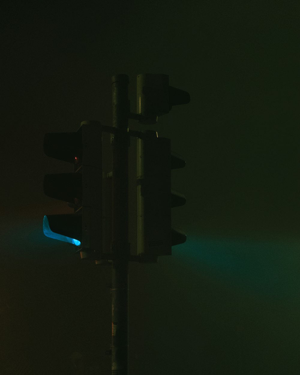 a traffic light with a blue light