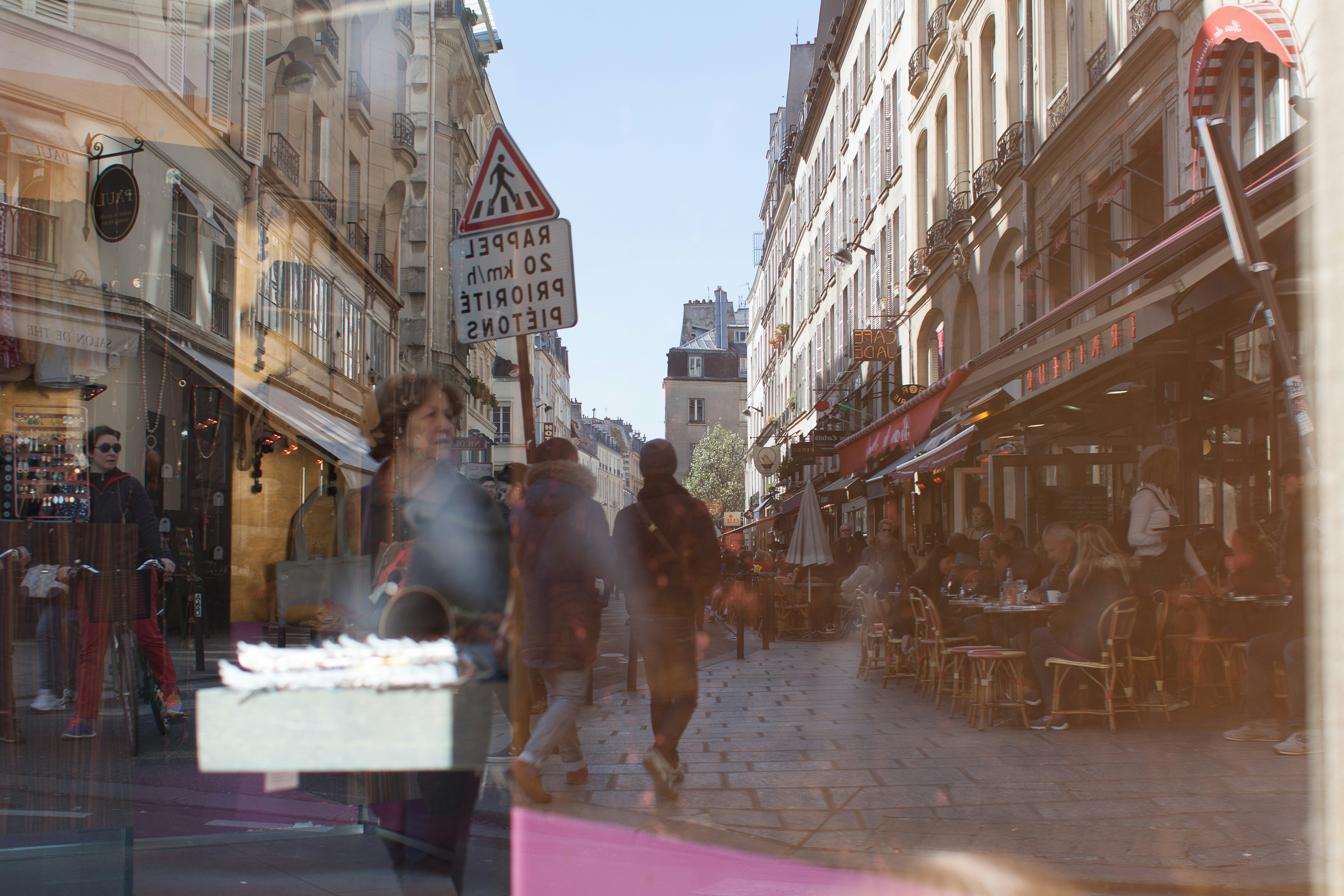 people walking down a street