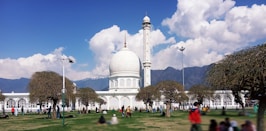 a large white building with a dome and a dome on top