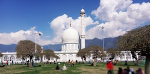 a large white building with a dome and a dome on top