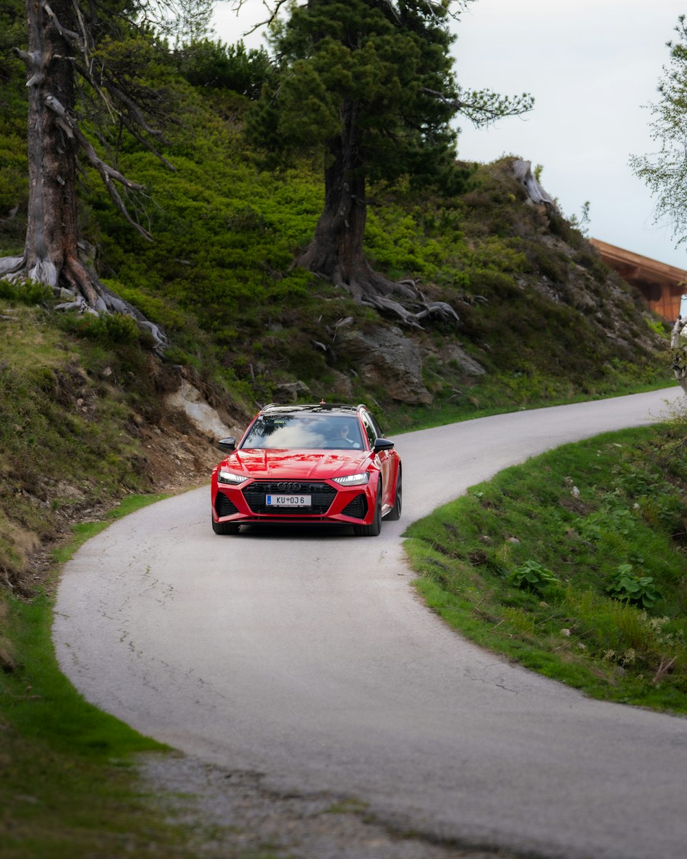 a red car on a road