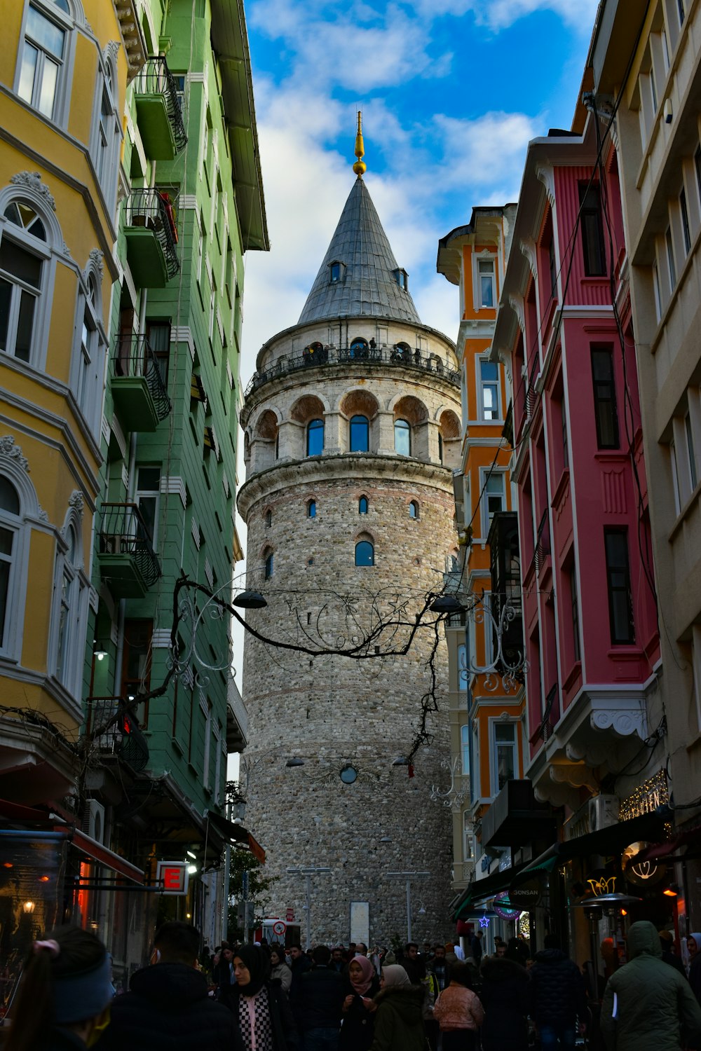 a stone tower in a city