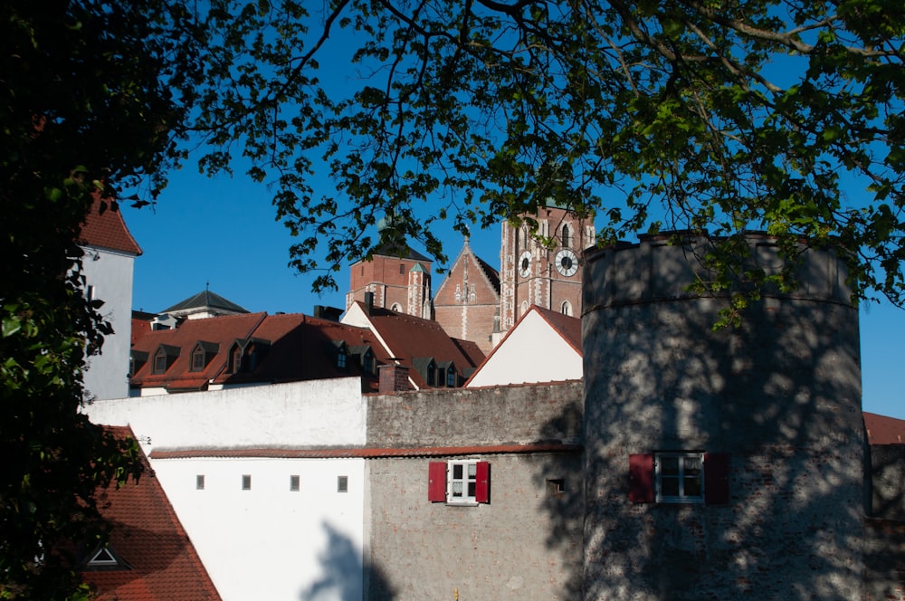 a stone wall with a clock tower