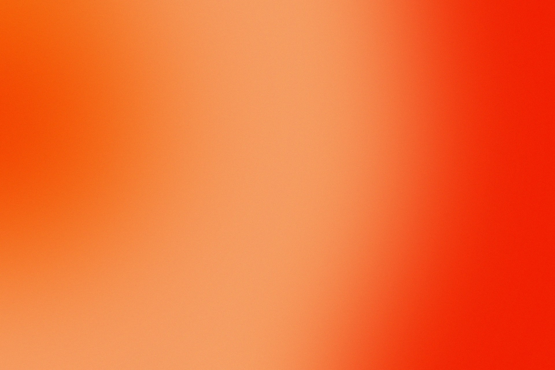 a close up of a red and orange background