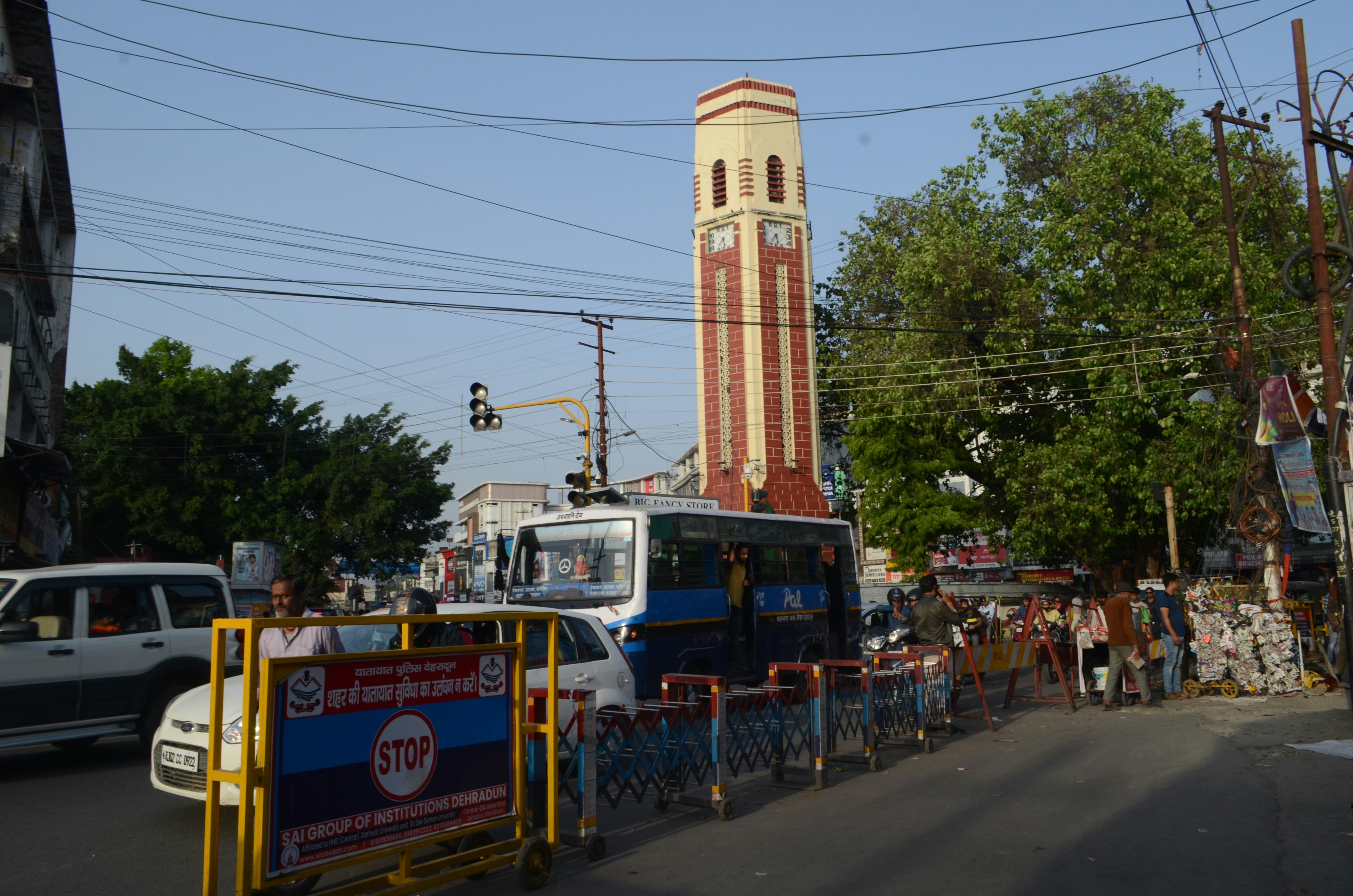 a bus and a truck on a street