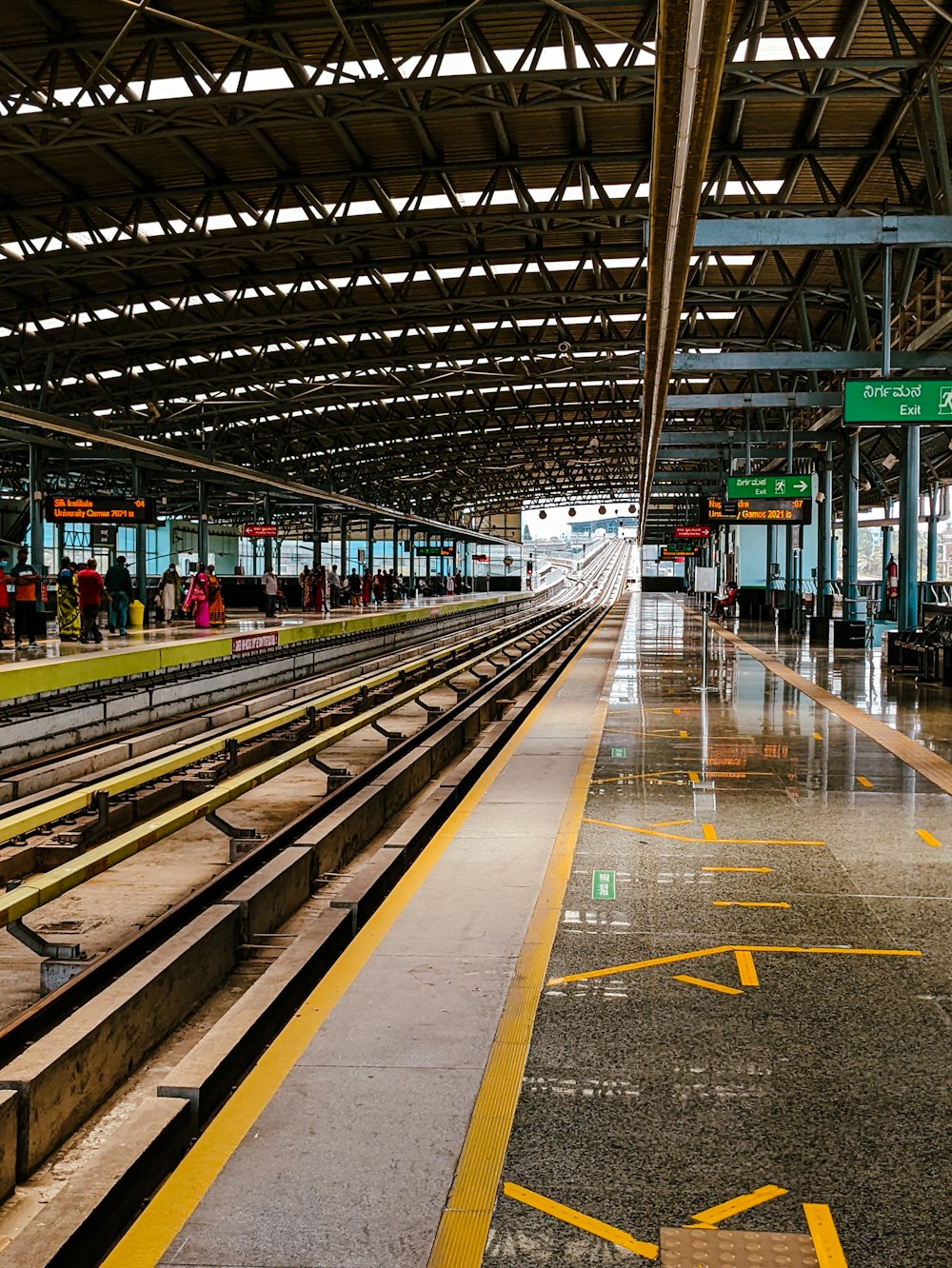 a train station with people