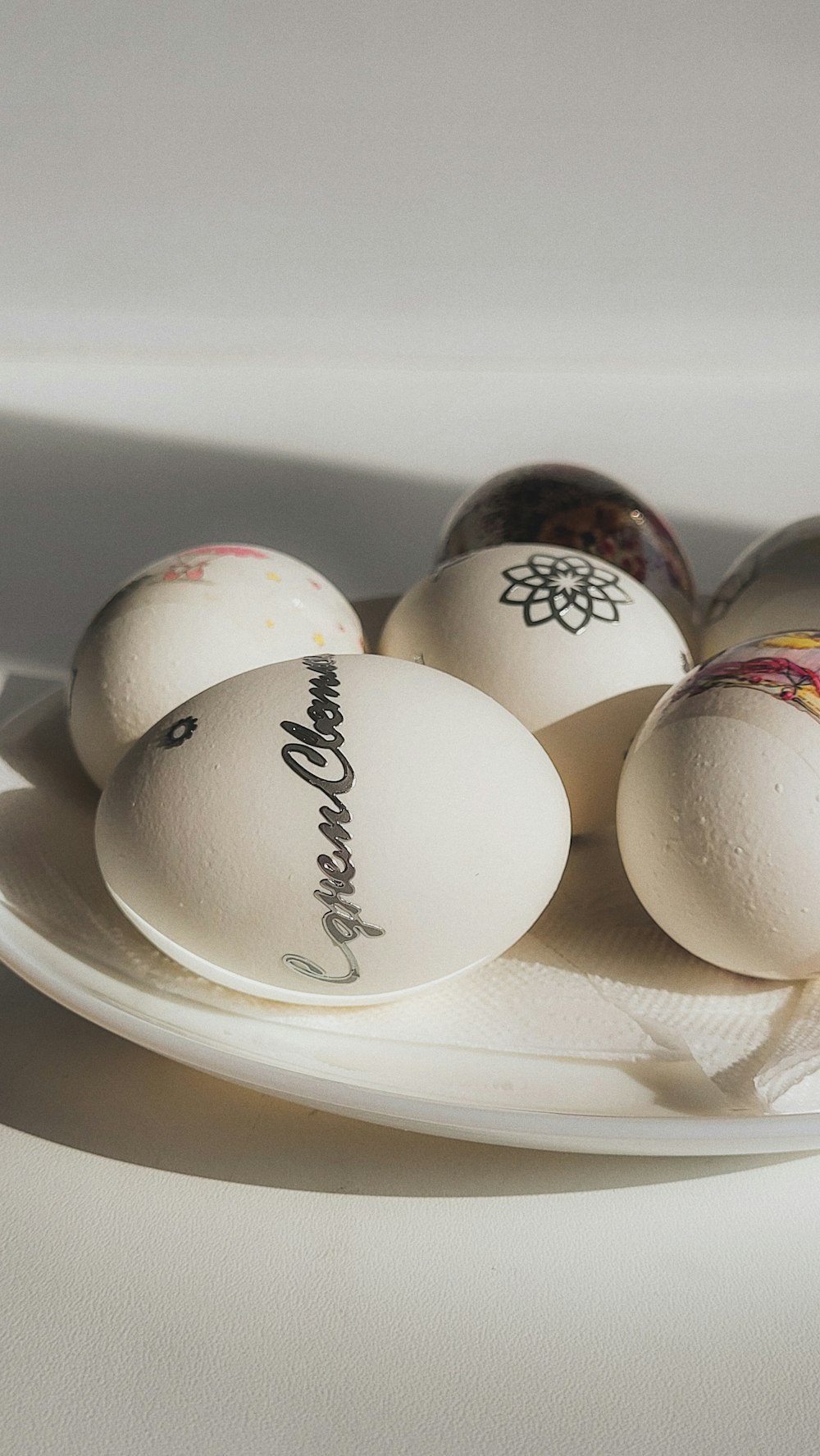 a group of eggs with writing on them