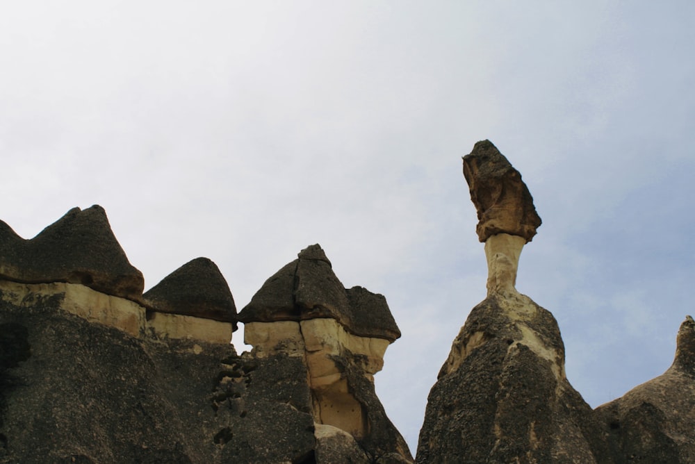 a statue on a rock