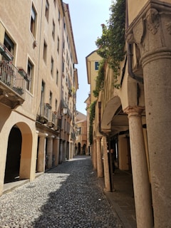 a narrow street with buildings on both sides