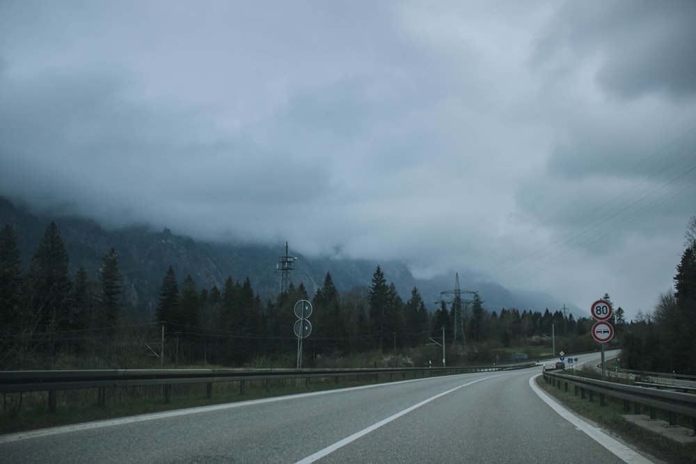 a road with trees on the side