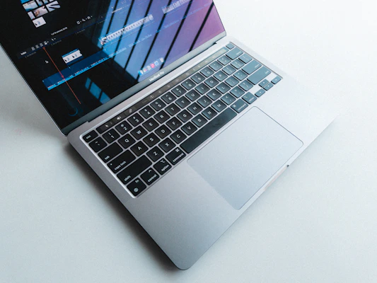 digital product concept showing a sleek laptop open to a beauty tutorial video
