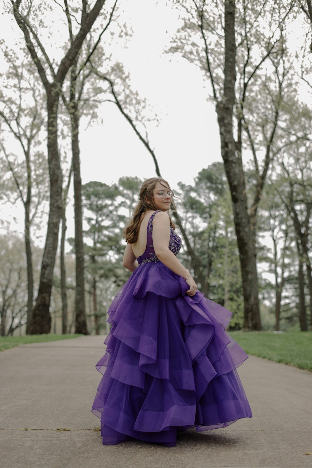 a woman in a purple dress