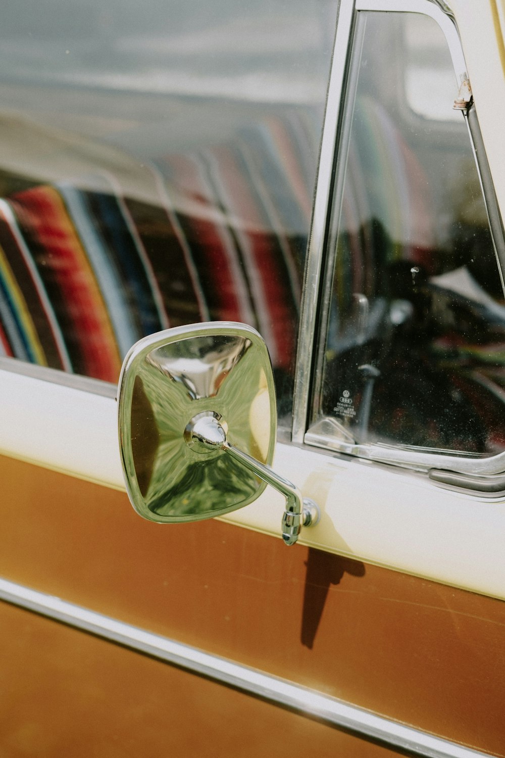 a car with a broken front mirror