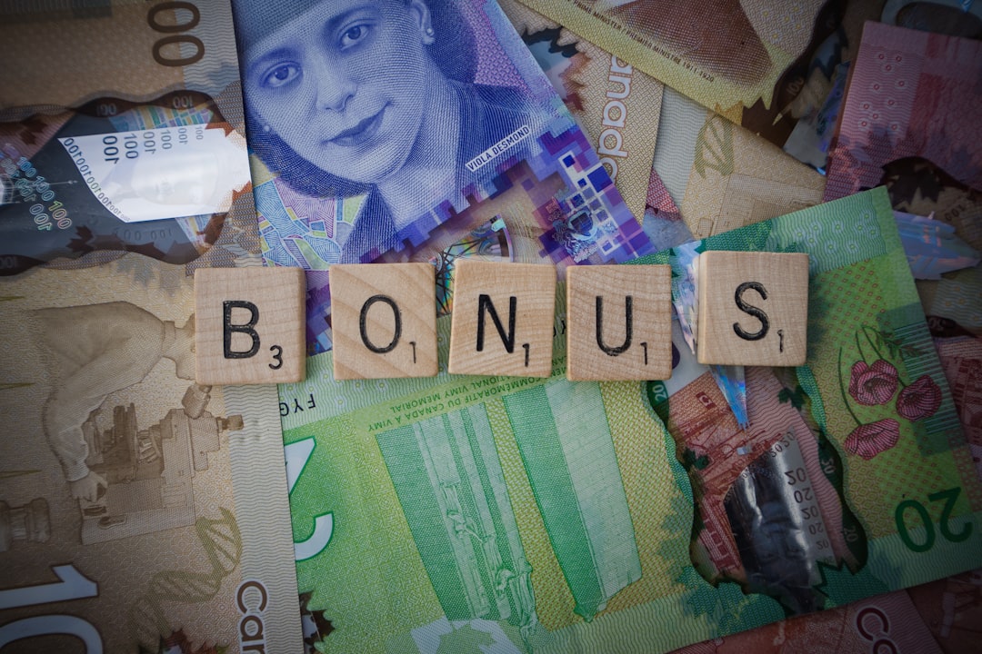 a pile of money, Scrabble letters spelling