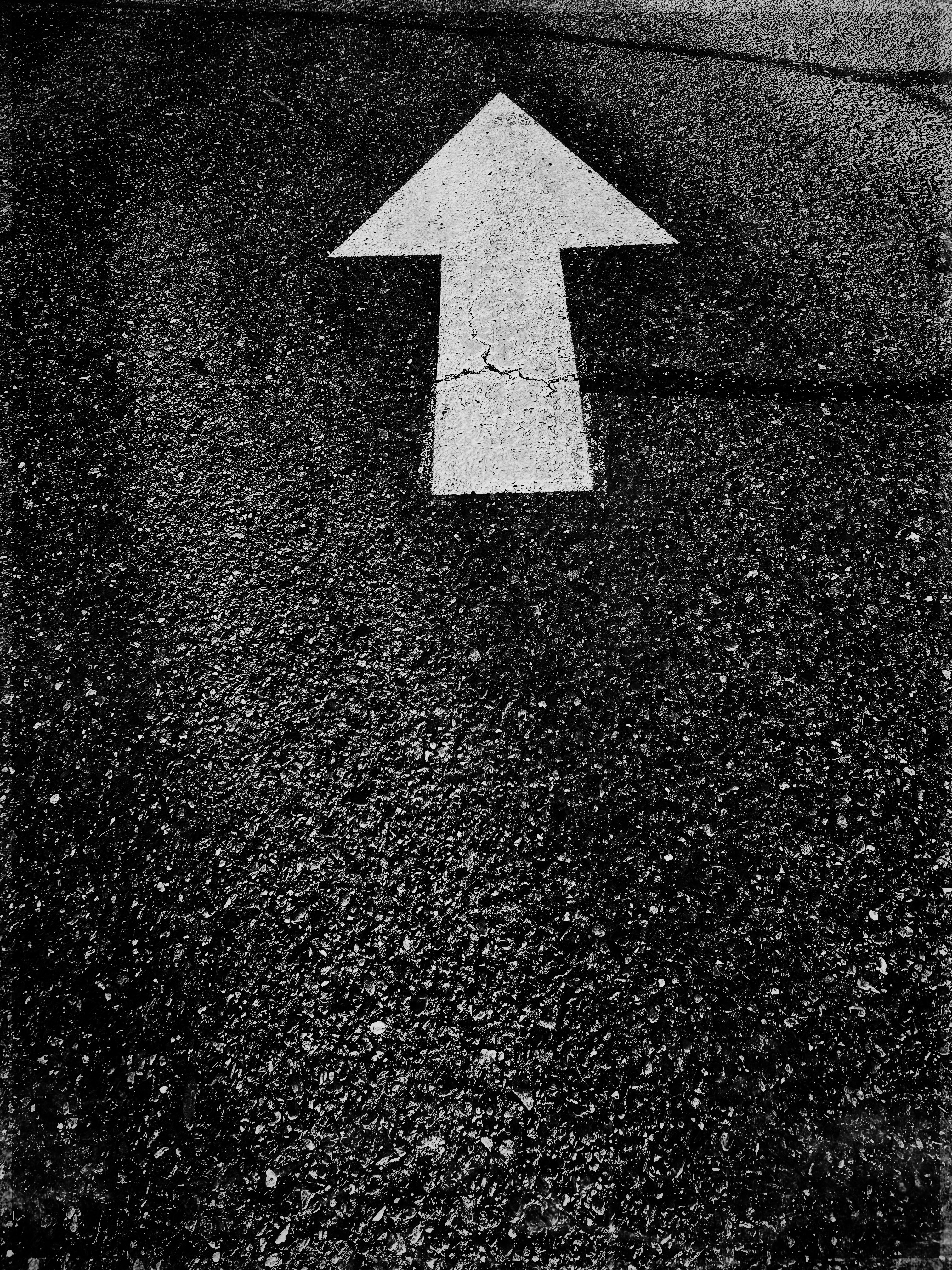 a white letter on a black surface