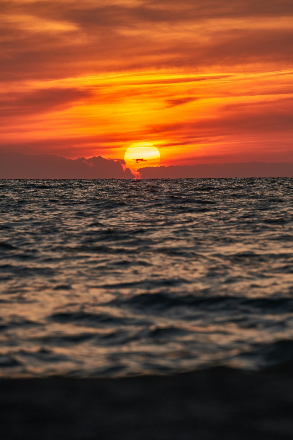 a sunset over the ocean