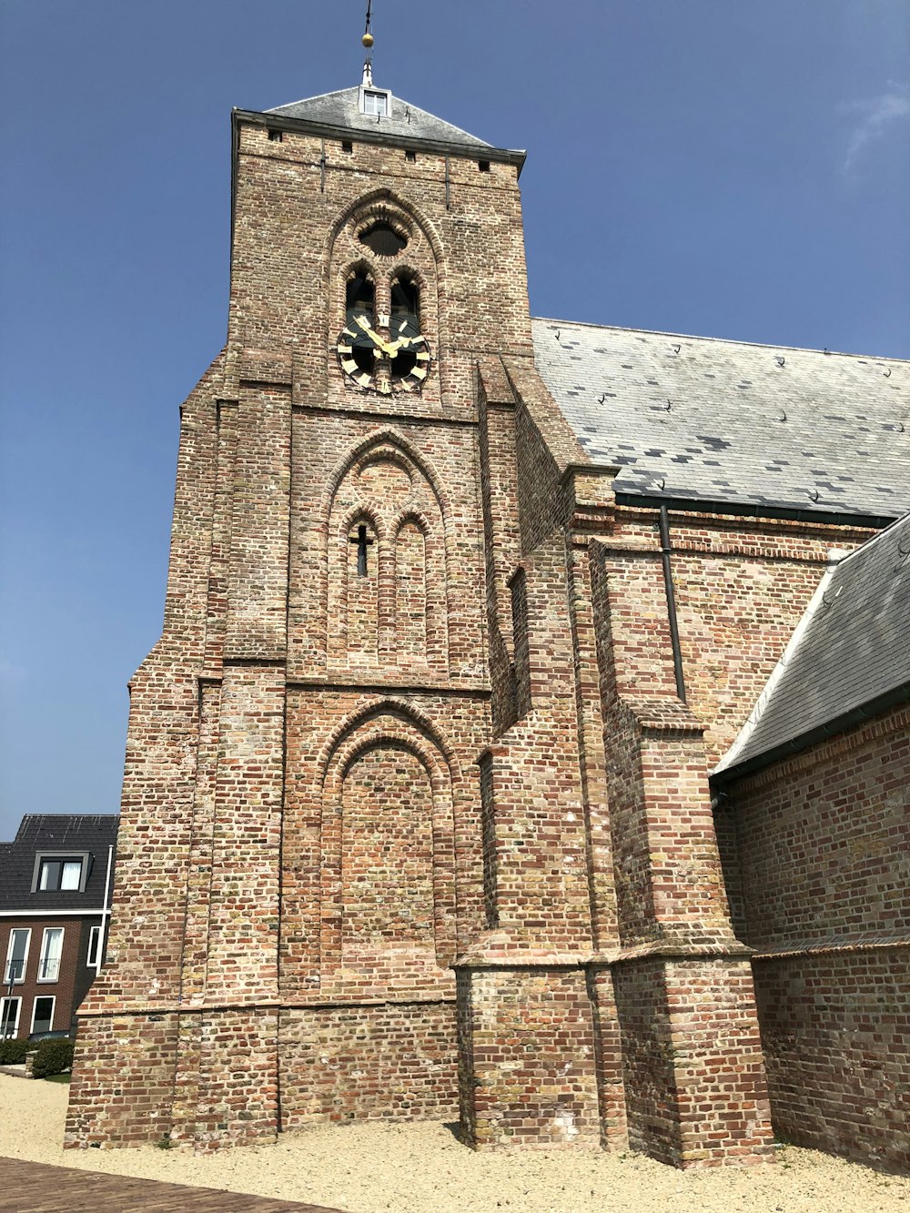 a brick building with a bell tower