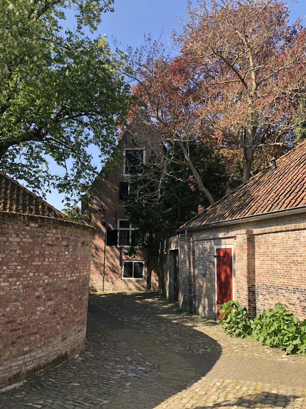 a brick building with a brick walkway